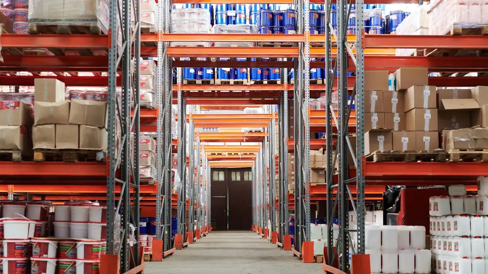 Warehouse shelving with cartons and stored inventory